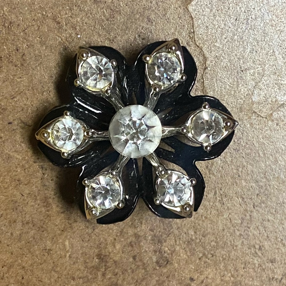 Vintage black and diamond snowflake brooch